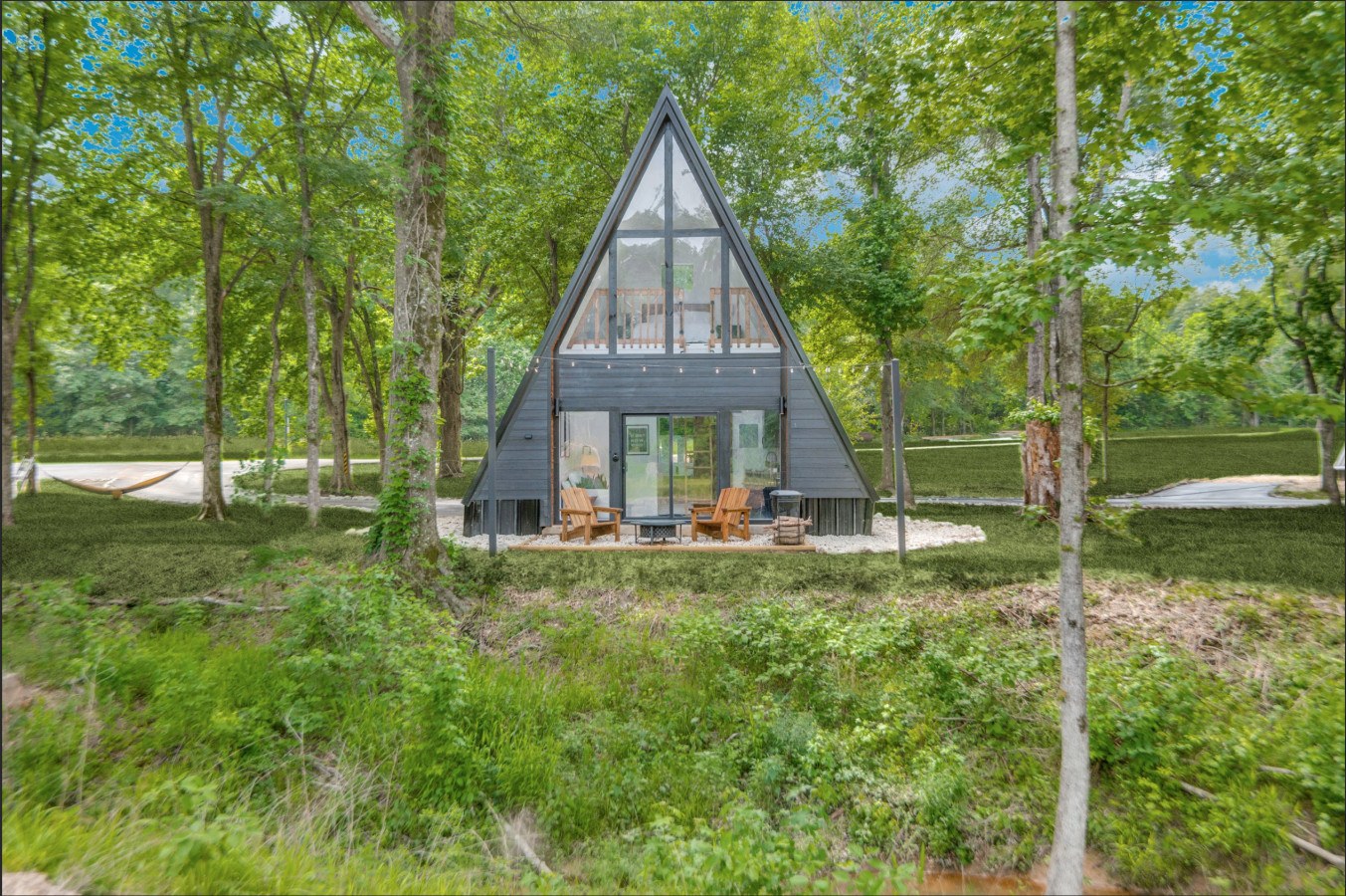 A-frame cabin among the trees at Lake Noire