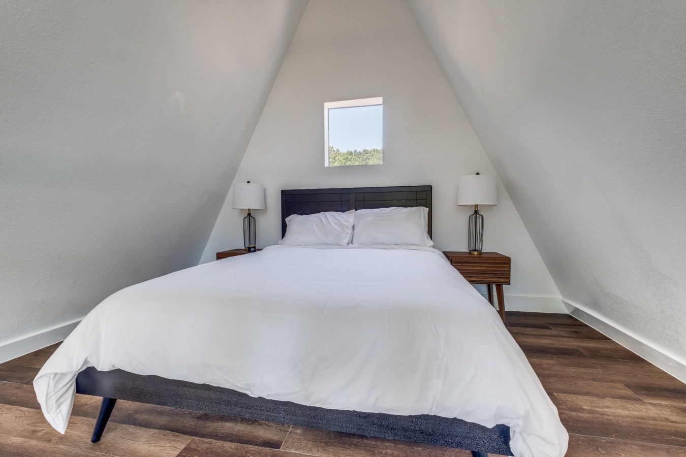 Loft bedroom in a Lake Noire cabin