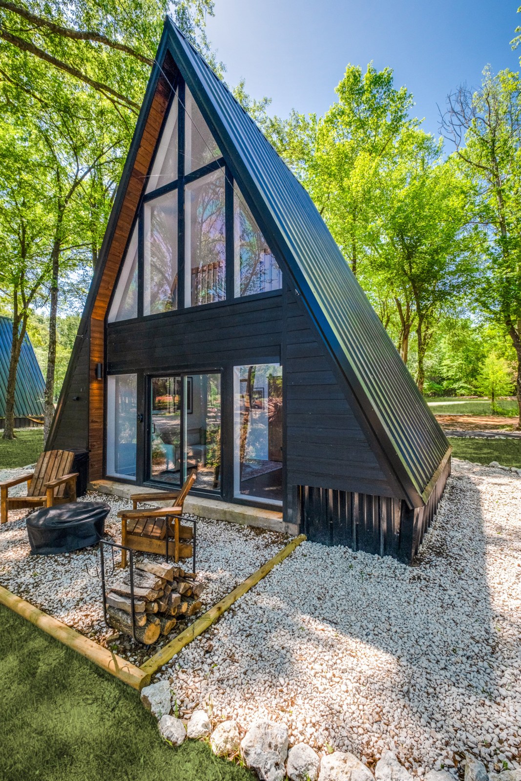 Cabin and seating in the wooded retreat