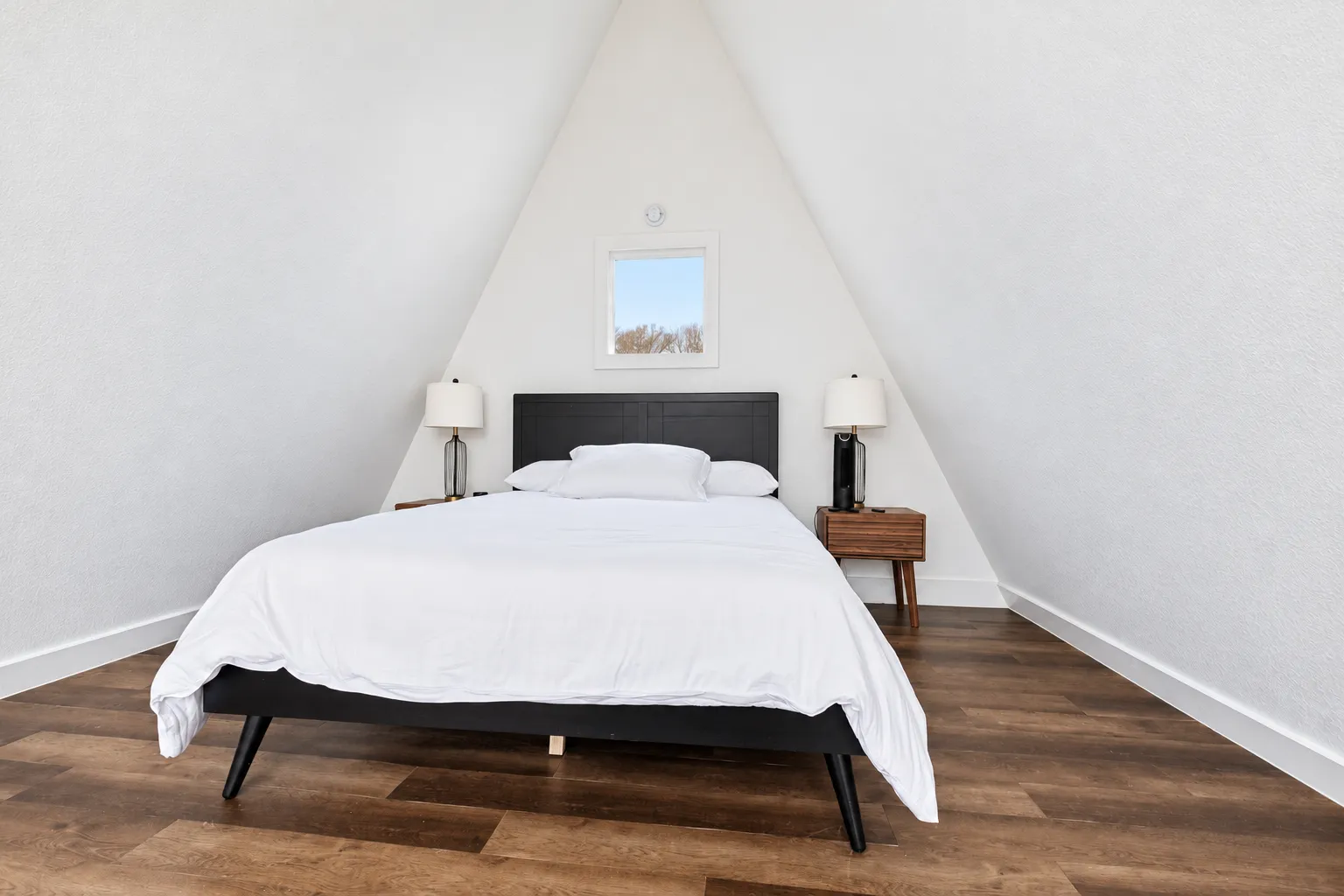 Loft and A-frame window in a Lake Noire cabin